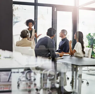 Team collaborating in a bright office meeting